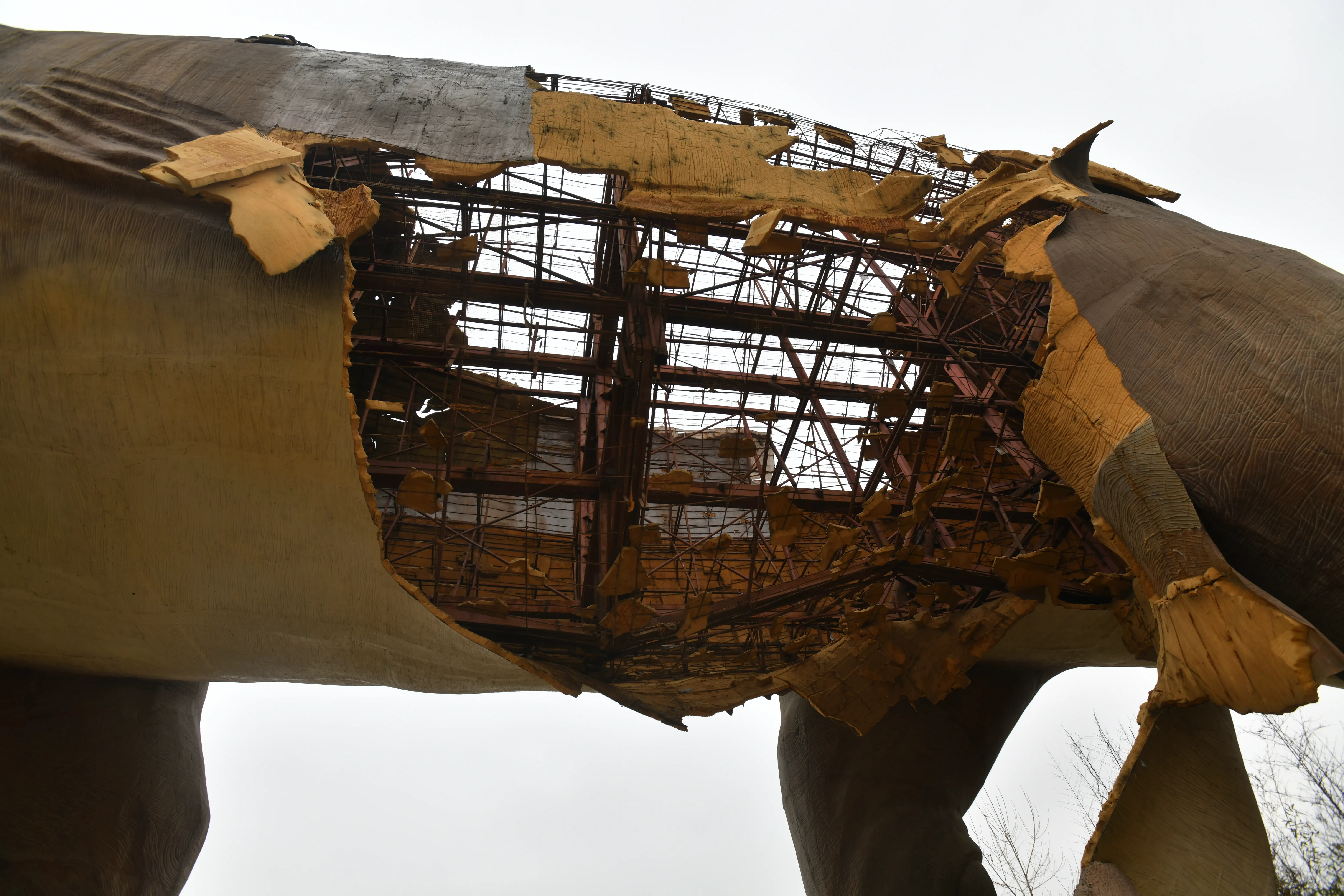Dismantled dinosaur statue